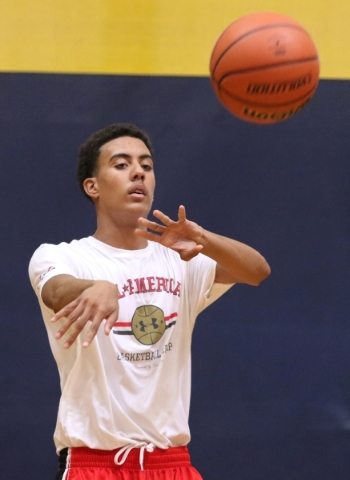 Greg Floyd Jr. passes the ball during a Las Vegas Knicks basketball practice at Tarkanian Ba ...