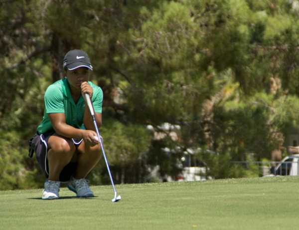 Aubrianna Jordan, a member of the Rancho High School golf team, lines up a putt at The Legac ...