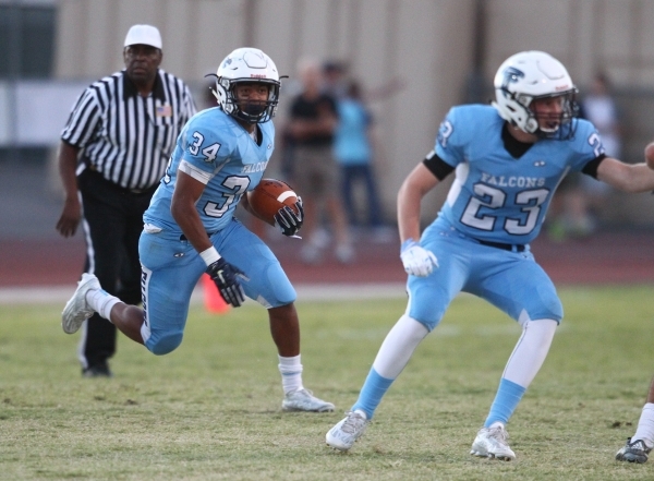 Silverado‘s Evan Tafoya (6) is taken down by Foothill defense during a football game a ...