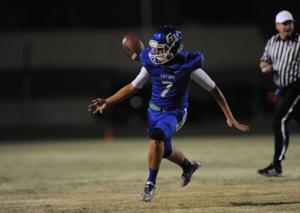 Green Valley quarterback Anthony Barilla fumbles the football while rushing against Arbor Vi ...