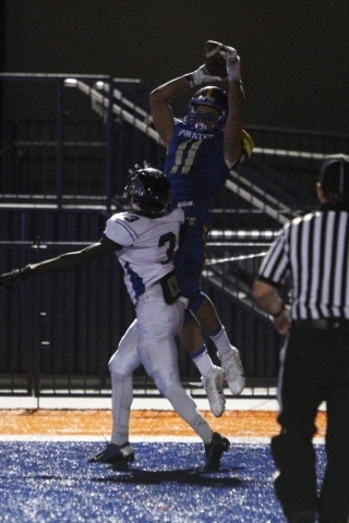 Moapa Valley wide receiver R.J. Hubert pulls in the game winning touchdown while being cover ...