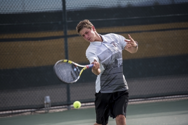 Desert Oasis junior Ben Gajardo hits the ball during a match at Bonanza High School in Las V ...