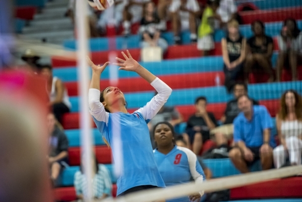 Destiny Gonzalez of Western High School prepares to set the ball against Faith Lutheran High ...