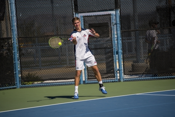 Ryland McDermott of Coronado High School hits a forehand against Petar Matejic of Green Vall ...