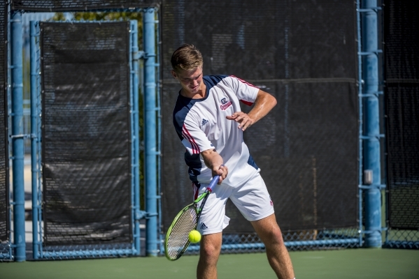 Ryland McDermott of Coronado High School hits a forehand against Petar Matejic of Green Vall ...