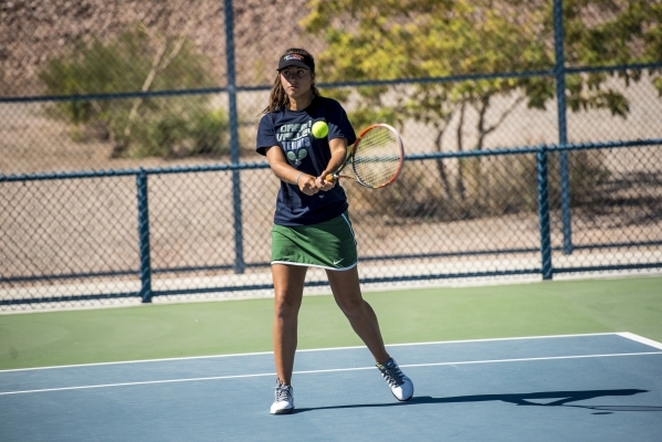 Dasha Shalina of Green Valley High School hits a backhand against Kaitlyn Picarillo of Liber ...