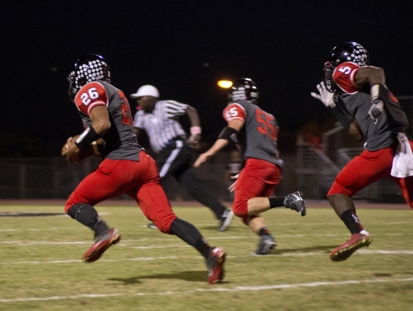 Las Vegas‘ Josh Perez (26) returns a Coronado fumble for a touchdown at Las Vegas High ...