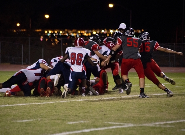 Las Vegas recovers a ball fumbled by Coronado during their prep football game at Las Vegas H ...