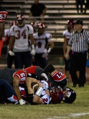 Coronado‘s Zacari Holbert (24) Las Vegas‘ Alexis Leon Ramirez (66) and Donye Ter ...