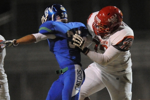 Arbor View linebacker Keenen King (72) blocks Green Valley cornerback Avery Fleharty in the ...