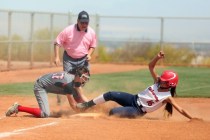 Lincoln County‘s Easton Tingey, left, makes the out as Liberty‘s Ashleigh Rodrig ...