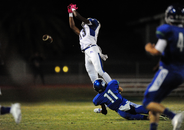 Basic Wolves wide receiver De‘Shawn Eagles is unable to catch a pass as Green Valley G ...