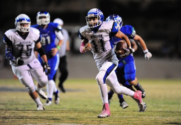 Basic Wolves linebacker John Funaki, left, and linebacker Tay‘Jean Thomas celebrate th ...