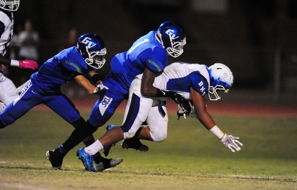 Basic Wolves middle linebacker running back John Funaki (8) scores the go-ahead touchdown as ...