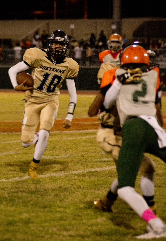 Cheyenne‘s Anthony McConnico (10) runs the ball up field during their prep football ga ...