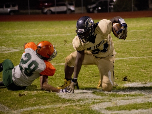 Mojave‘s David Walker (34) comes to a stop after running the ball downfield during the ...