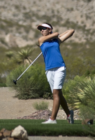 Hunter Pate, of Bishop Gorman High School, hits her ball during the Sunset Region golf tourn ...