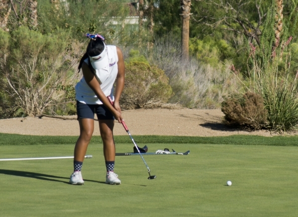 Sami Penor, of Coronado High School, hits her ball during the Sunrise Region golf tournament ...