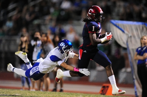 Green Valley Gators safety Ty Rivera tackles Coronado Cougars wide receiver Da Qu‘an D ...