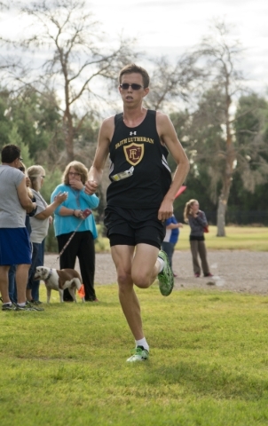 Chase Wood, of Faith Lutheran High School, leads his race during the Cross Country Division ...