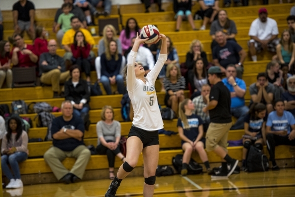 Hayley Huntsman of Bonanza puts the ball up into play during a volleyball match against Cent ...