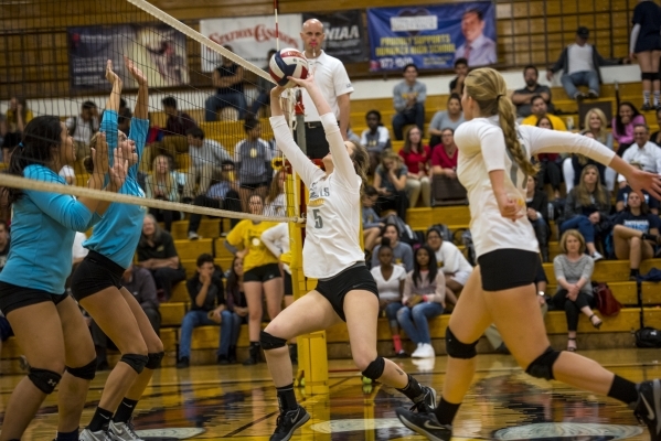 Hayley Huntsman of Bonanza puts the ball up into play during a volleyball match against Cent ...