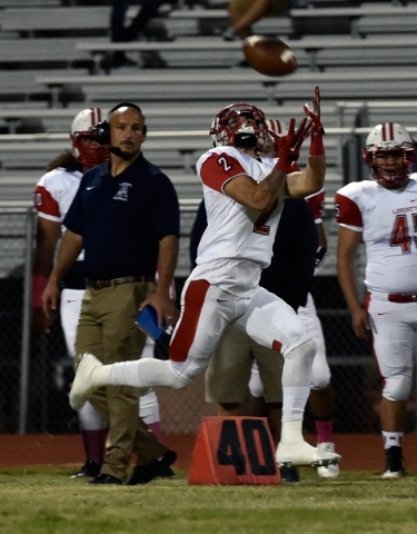 Liberty‘s Ethan Dedeaux makes a catch against Silverado during the first half of a hig ...