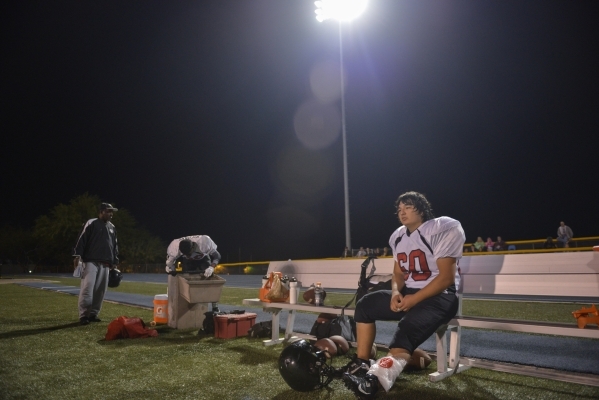 Mountain View Christian High School football player David Stanik sits on the sidelines after ...