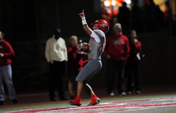 Arbor View running back Morris Jackson rushes for a touchdown on the first play of scrimmage ...