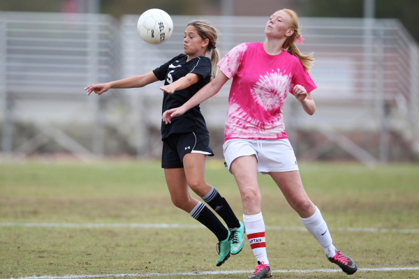 Palo Verde‘s Peyton Feller (5), left, fights for ball possession against Legacy in the ...