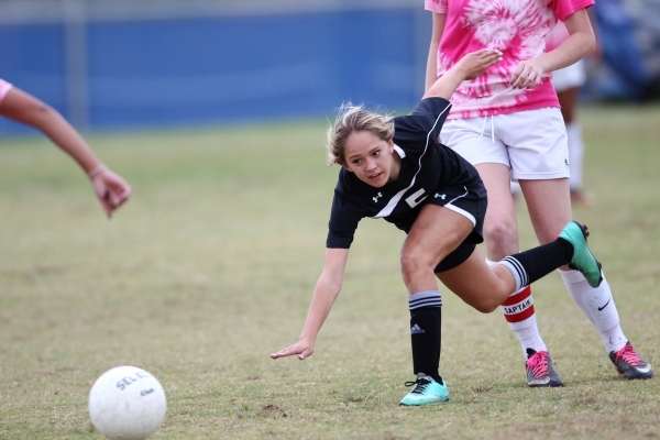 Palo Verde‘s Peyton Feller (5) fights for ball possession against Legacy in their girl ...