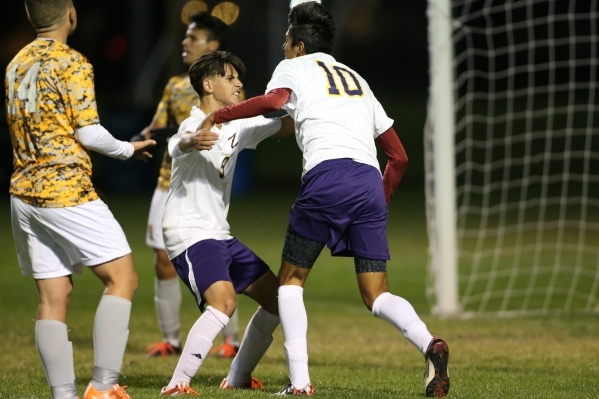 Durango‘s Giovanni Rodriguez (10) celebrates his goal with his teammate Jaime Munguia ...