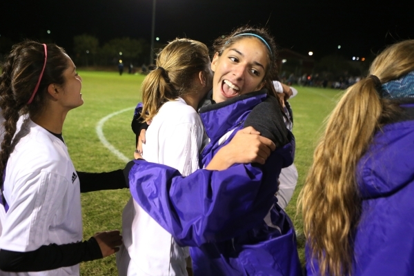 Silverado‘s Francesca Locascio (13), right, embraces Chase Jenkins (2) as they celebra ...