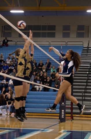 Liberty‘s Pualani Tuika (23) hits the ball over the net during the Sunrise Region girl ...