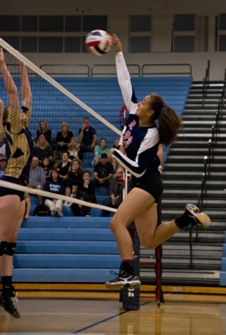 Liberty‘s Pualani Tuika (23) hits the ball over the net during the Sunrise Region girl ...