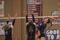 Shadow Ridge‘s Whittnee Nihipali (15) hits the ball over the net during the Sunset Reg ...