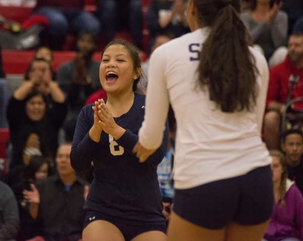 Shadow Ridge‘s Kamryn Ramirez (8) celebrates a point during the Sunset Region girls vo ...