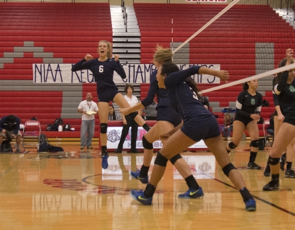 Shadow Ridge High School celebrates after winning the Sunset Region girls volleyball semifin ...