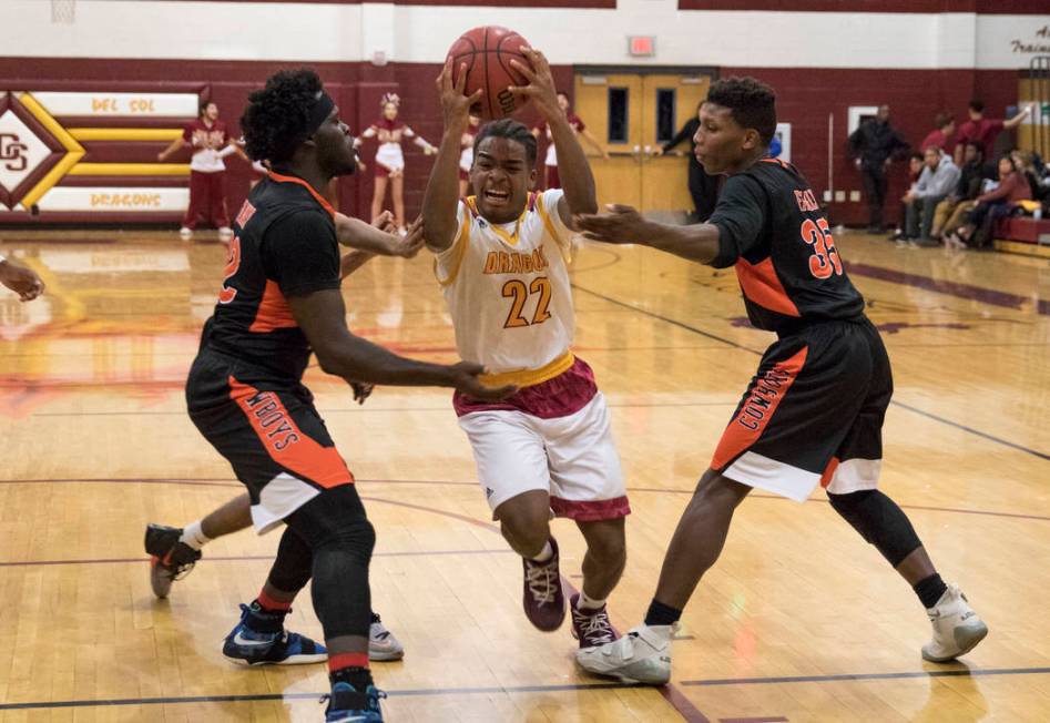 Del Sol’s Keith Seldon (22) goes up for a shot against Chaparral’s Dejonte Allen ...