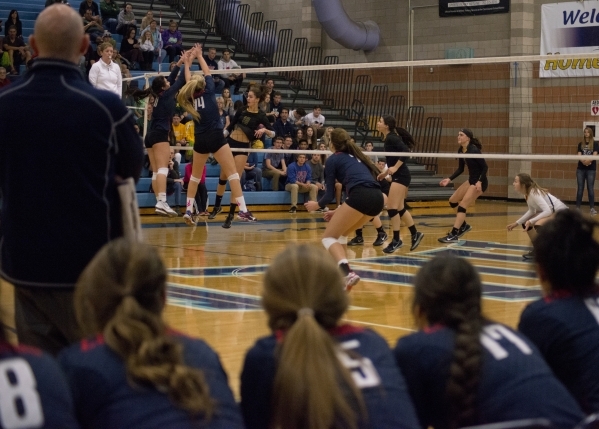 Members of the Coronado girls volleyball team watch their team play during the division I st ...