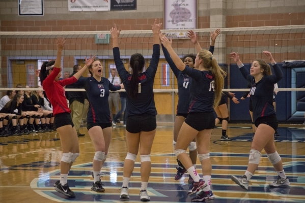 Coronado celebrates a point during the division I state volleyball final match between Coron ...