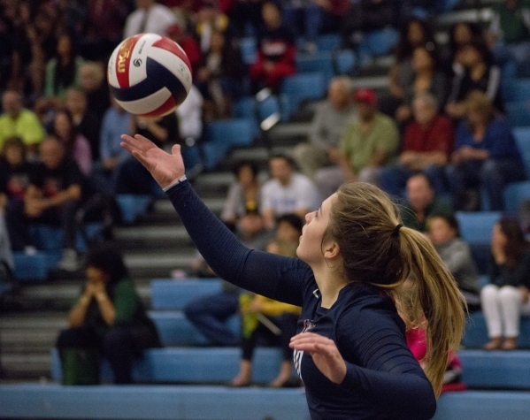 Coronado‘s Emily Bender (10) serves during the division I state volleyball final match ...