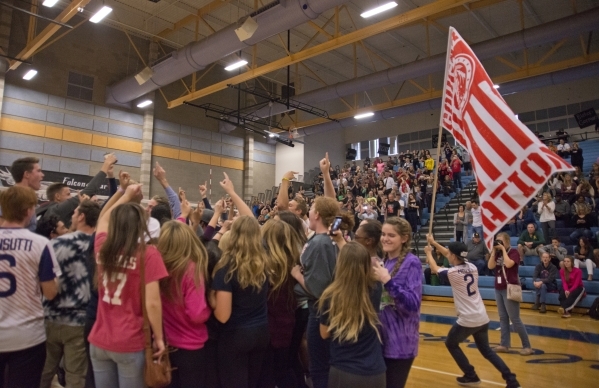 Coronado celebrates after winning the division I state volleyball final match between Corona ...