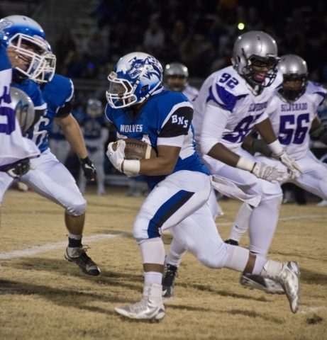 Basic‘s Sean White (34) runs the ball up the field during the Sunrise Region semifinal ...