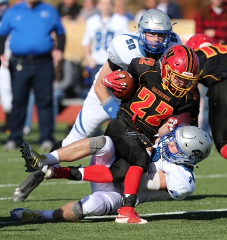 Pahranagat Valley‘s Shawn Wadsworth brings down Whittell‘s Corey Huber in the fi ...