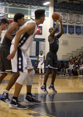 Desert Pines‘ Jordan Simon (2) shoots a free throw during their game at Centennial Hig ...