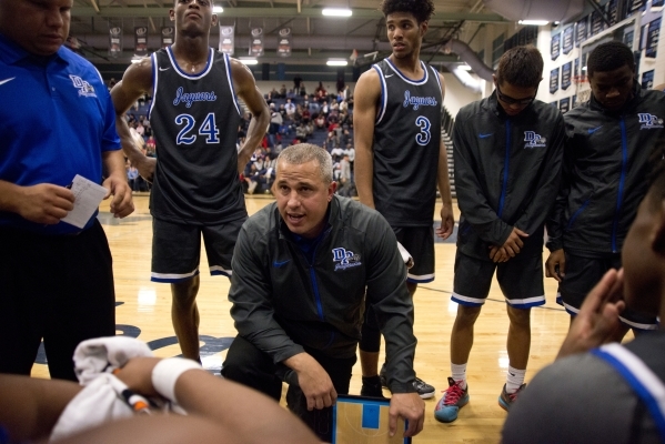 Desert Pines‘ head coach Mike Uzan is seen during their game at Centennial High School ...