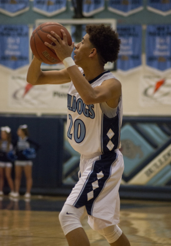 Centennial‘s Elysha Jackson (20) looks to pass the ball during their game against Dese ...