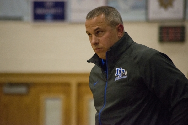 Desert Pines‘ head coach Mike Uzan is seen during their game at Centennial High School ...