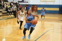 Canyon Springs D‘Licya Feaster (25) goes up for a layup against Cheyenne during their ...